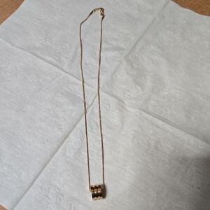 Calvin Klein Rose Gold Necklace with Triple Ring Pendant Never Worn